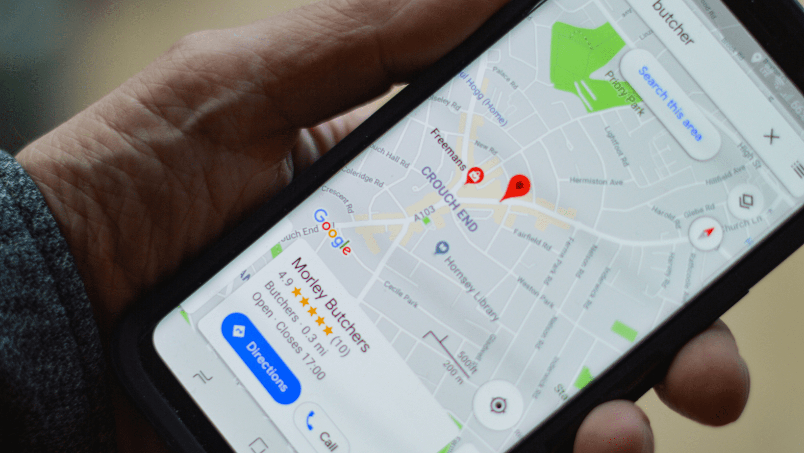 Person looking for a business on Google Maps